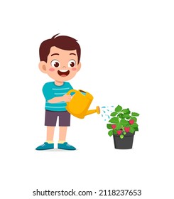 cute little boy stand and watering strawberry tree