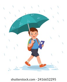 Pequeño estudiante lindo sosteniendo un paraguas bajo la lluvia yendo a la escuela