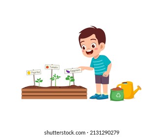 cute little boy take care of vegetable plant