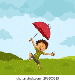 Cute little boy with umbrella, dancing and enjoying in rains on nature background.