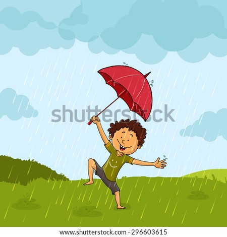 Cute little boy with umbrella, dancing and enjoying in rains on nature background.