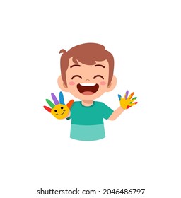 cute little boy using paint to hand for art