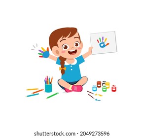 cute little boy using paint to hand for art