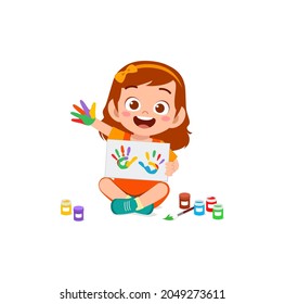 cute little boy using paint to hand for art