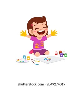 cute little boy using paint to hand for art