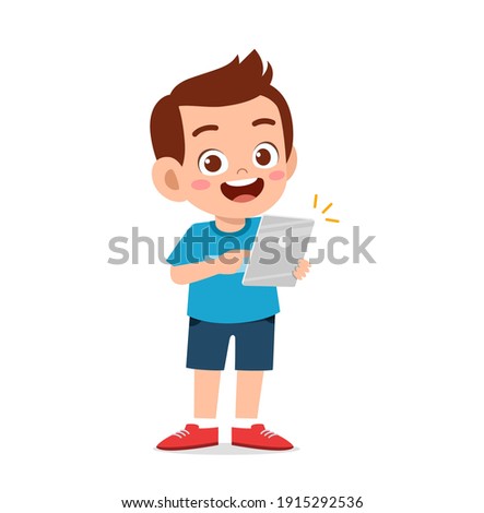 cute little boy using smartphone and internet