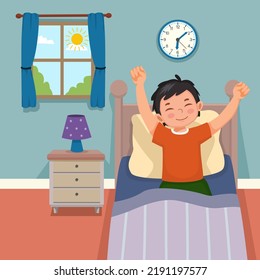 Cute little boy wake up in morning stretching hands on bed in bedroom