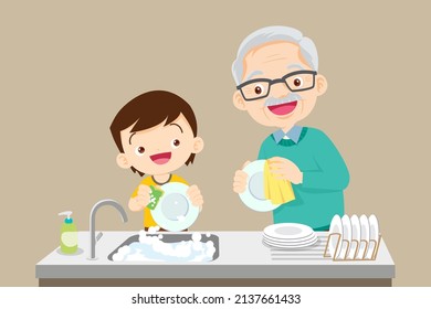 cute little boy washing dish with grandfather