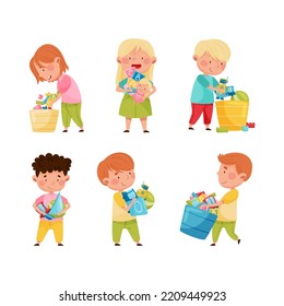 Cute little boys and girls putting toys into boxes set. Kids doing housework chores at home cartoon vector illustration