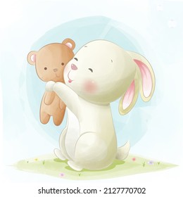 Cute little bunny embraces teddy bear