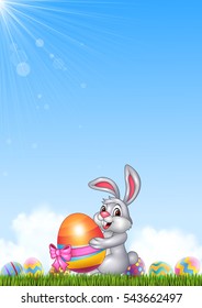 Cute little bunny holding easter egg
