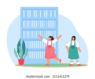 Cute little cartoon girls in library or bookstore. Happy children in bookshop flat vector illustration. Education, knowledge, literature concept for banner, website design or landing web page