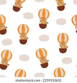 Cute little cheetah flying on hot air balloon seamless childish pattern. Funny cartoon animal character for fabric, wrapping, textile, wallpaper, apparel. Vector illustration