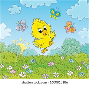 Cute little chick dancing for joy with colorful butterflies among wild flowers of a green lawn on a sunny spring morning, vector cartoon illustration