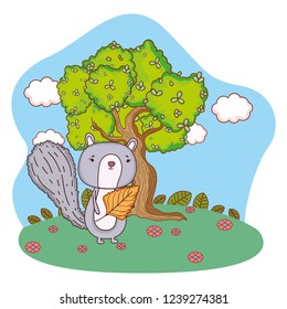 cute little chipmunk with leaf in the field