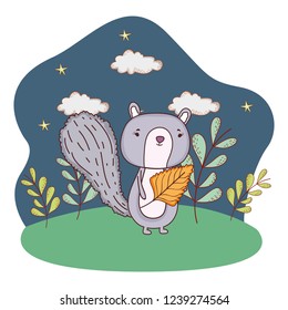 cute little chipmunk with leaf in the field