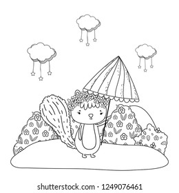cute little chipmunk with umbrella in the field