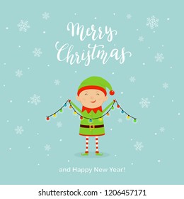 Cute little Christmas elf in a green holiday costume with hat and shoes holding colorful christmas lights. Lettering Merry Christmas and Happy New Year on with falling snowflakes, illustration.
