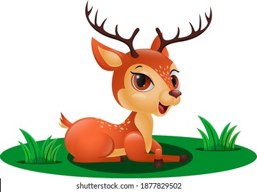 Cute little deer sitting in the grass