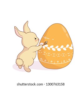 Cute little easter bunny is coloring egg. Vector illustration on white background. Happy Easter card.