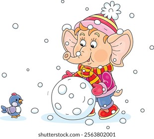 Cute little elephant playing with a merry small bird and making a big snowball for a toy snowman on a winter walk in a snowy forest, vector cartoon illustration on a white background