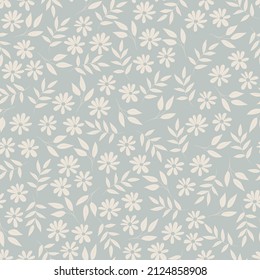 Cute little flowers seamless pattern. White flowers on a gray floral background. Botanical vector illustration. Liberty style. Garden plants are repetitive.