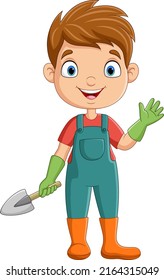 Cute little gardener boy holding a shovel