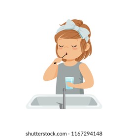 Cute little girl brushing her teeth, kid caring for teeth in bathroom vector Illustration on a white background