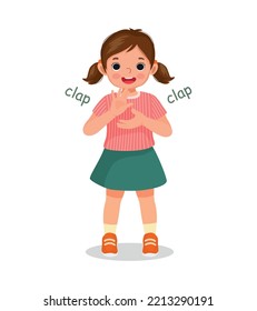 Cute little girl clapping her hands  expressing positive emotion of happiness, enjoyment, appreciation and congratulation gesture