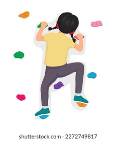 Cute little girl climbing wall with colorful rock