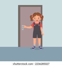 Cute little girl closing the door