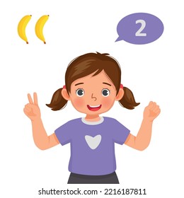 Cute little girl counting with finger showing number two with hand gesture