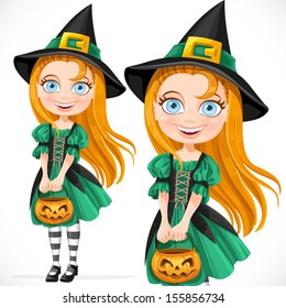 Cute little girl dressed as a witch with pumpkin for candy