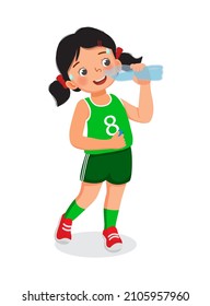 Cute little girl drinking fresh water from a bottle feeling thirsty after doing sport exercise