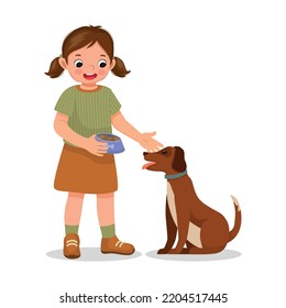 cute little girl feeding her dog pet with animal food