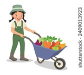 Cute little girl gardener pushing wheelbarrow full of fruits and vegetables