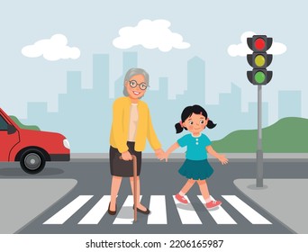 Cute little girl help elderly grandmother crossing street at the pedestrian traffic