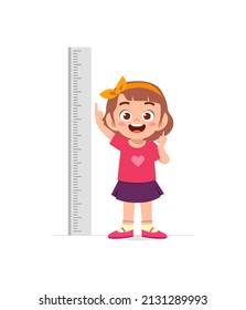 cute little girl measure height for grow progress