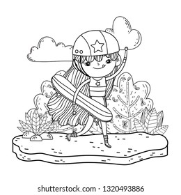 cute little girl mounted in skateboard in landscape
