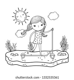 cute little girl mounted in skateboard in landscape