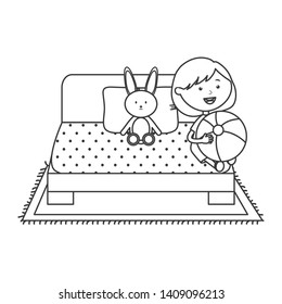 cute little girl with plastic balloon and rabbit in the bed