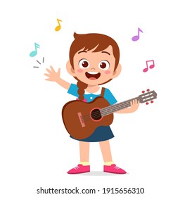 cute little girl play guitar in concert