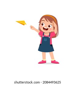 cute little girl play paper plane and feel happy