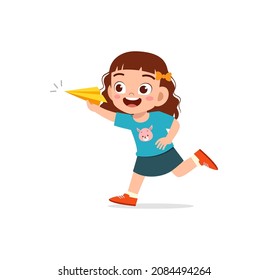 cute little girl play paper plane and feel happy