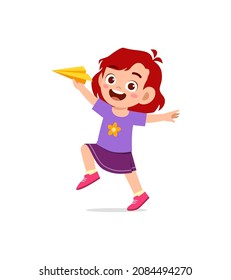 cute little girl play paper plane and feel happy