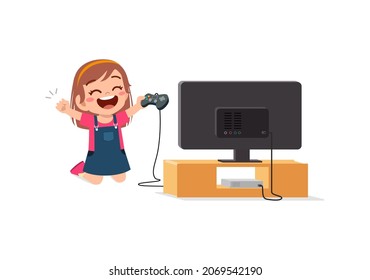 cute little girl play video game on big screen