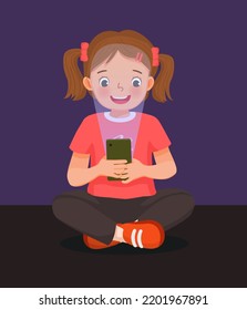 cute little girl playing game with smart phone at night with blue light reflection harmful to eyes 