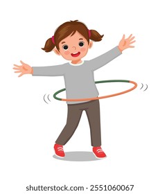 Cute little girl playing hula hoop