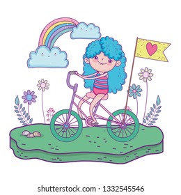 cute little girl riding bicycle in the landscape