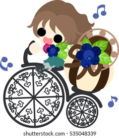 A cute little girl riding a bicycle and the chocolate box